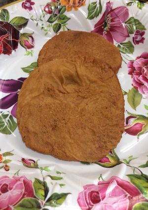 A picture of Adhirsam (sweet of rice flour and jaggery).