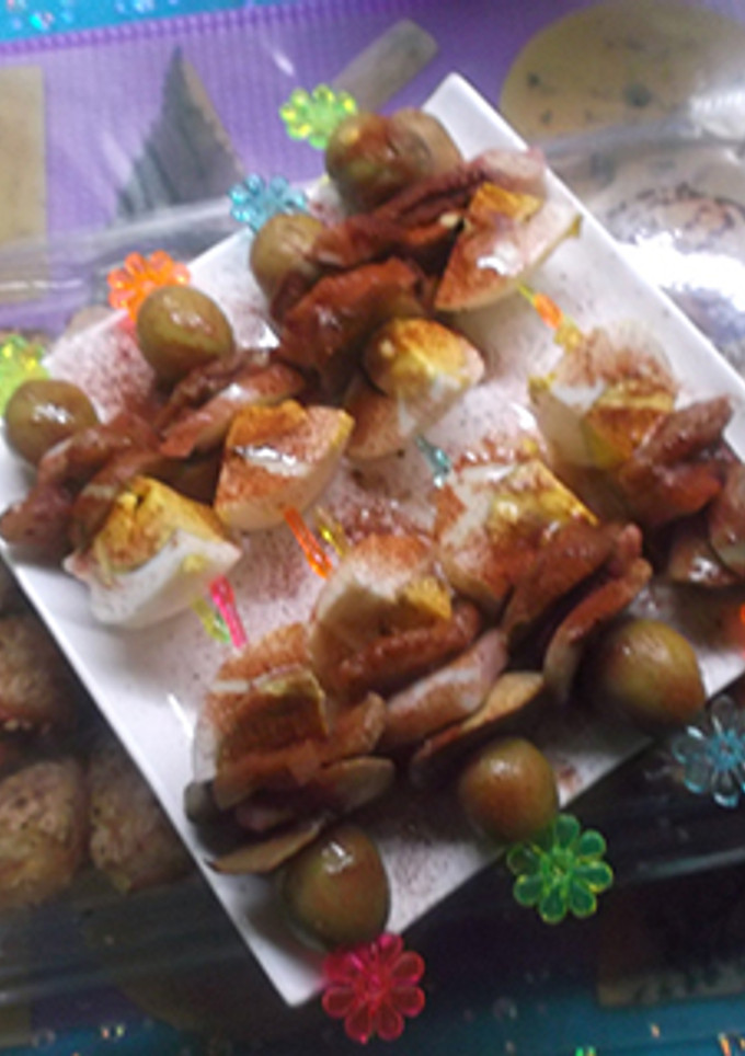 Una foto de Banderillas de pulpo y huevo duro