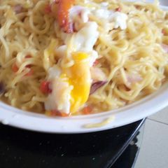A picture of Indomie with cook egg.