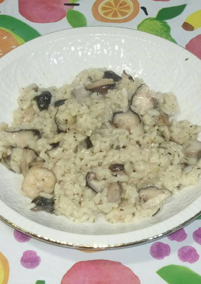 Una foto de Risotto de setas con gambas