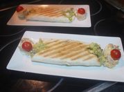 Una foto de sobra de boquerones fritos