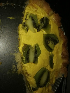 Una foto de Tartaleta crema y kiwi