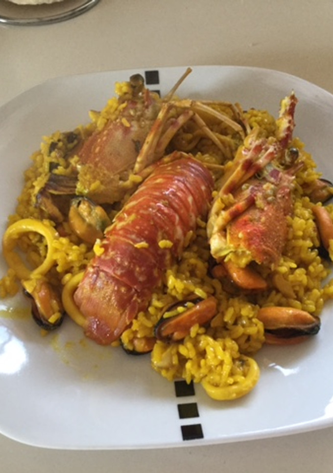 Una foto de Arroz con langosta