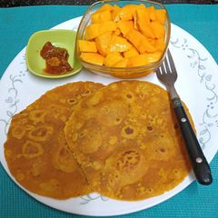 A picture of Shiraman ---- Dashmi with Fresh Mango 🥭 (Gujarati Breakfast).
