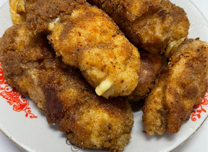 Фото Куриная грудка с сыром в сухарях.