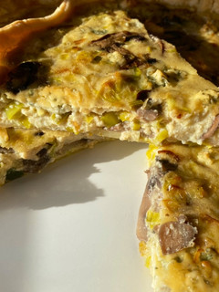 Una foto de Quiche de pera y champiñones