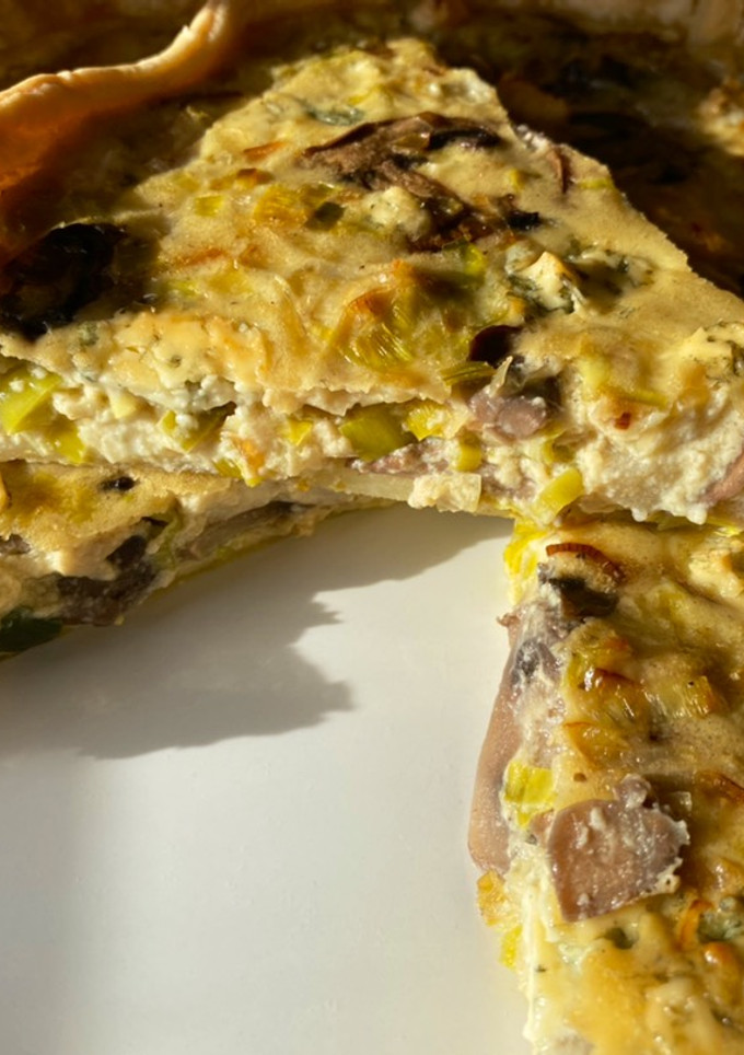 Una foto de Quiche de pera y champiñones