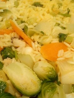 Una foto de Arroz con sepia y coles de Bruselas
