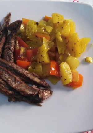 Una foto de Boquerones fritos  con patatas al curry