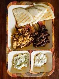 A picture of Shawarma Platter with Mayo Dip,Tartar Sauce and Sauted Kidney Bean.
