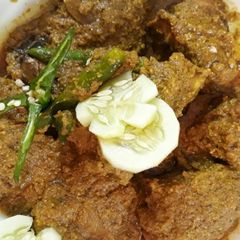 A picture of Mustard 'Rui' Fish Curry.