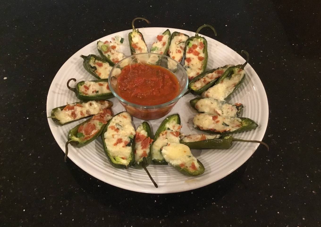 Roasted Pepperoni and cheese stuffed Jalapeños