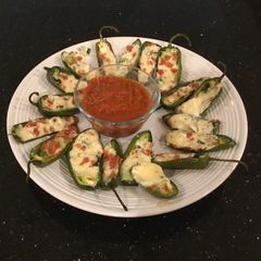 A picture of Roasted Pepperoni and cheese stuffed Jalapeños.