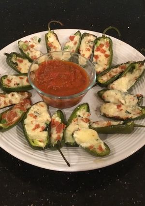 A picture of Roasted Pepperoni and cheese stuffed Jalapeños.