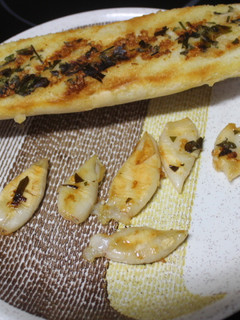 Una foto de Chipirones al grill con ajo y perejil