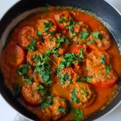 A picture of Stuffed Tomatoes.