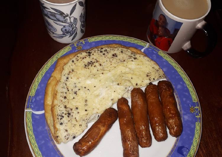 Plain omelette and deep fried sausages