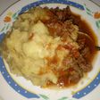 Mashed bananas with beef stew