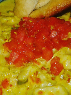 Una foto de Ñoquis de batata con salsa de curry y zanahorias👌
