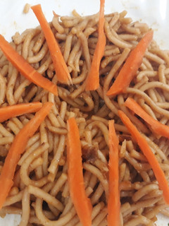 A picture of Spagetti and carrots.