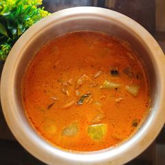 A picture of Dry prawn curry with madras cucumber.