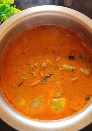 A picture of Dry prawn curry with madras cucumber.