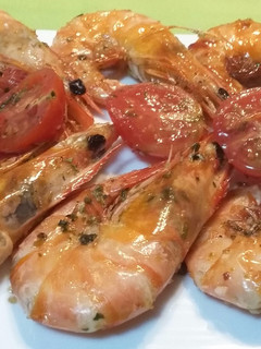 Una foto de Langostinos flambeados