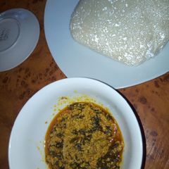 A picture of Semo with bitter leaf soup.
