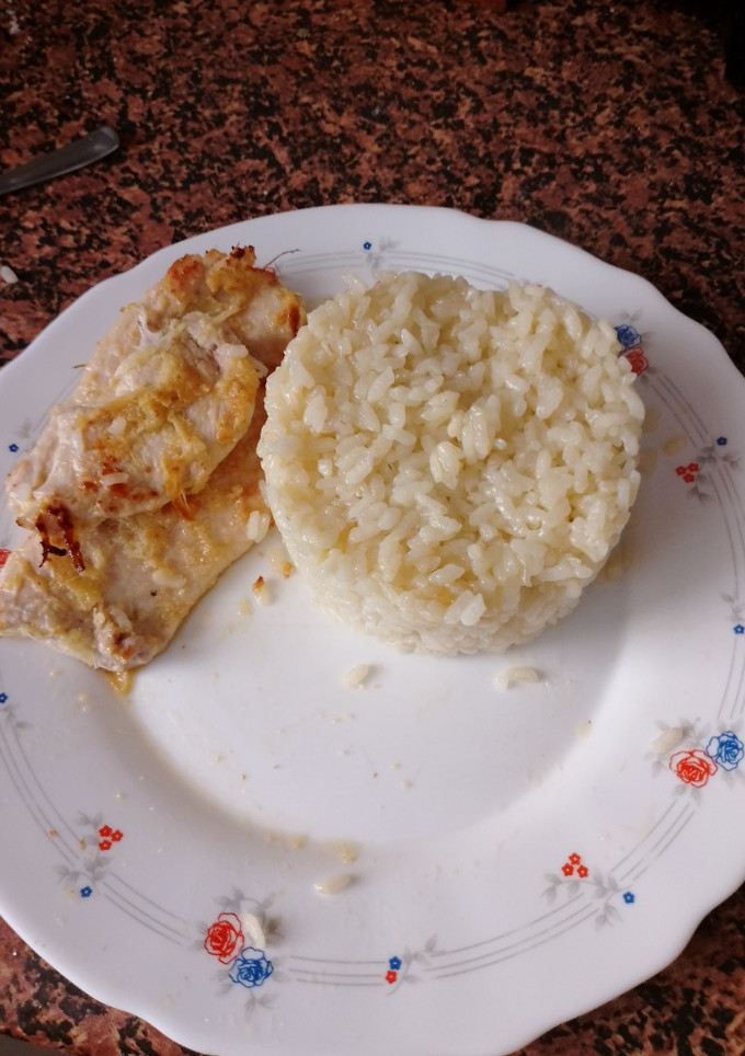 Una foto de Arroz con Caldo de Pollo