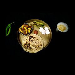 A picture of Traditional Bharwa meal.
