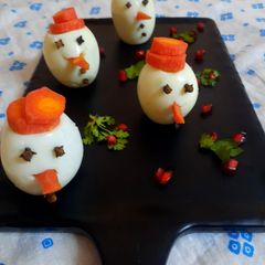 Boiled egg cut snowman A picture of Boiled egg cut snowman.