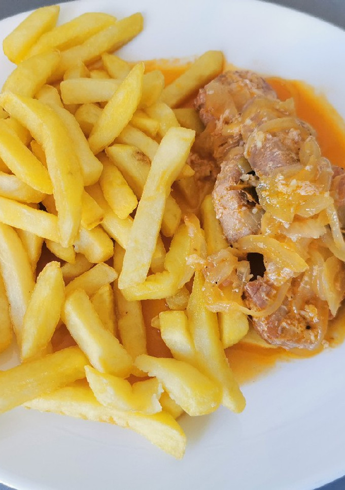 Una foto de Atún encebollado🐟