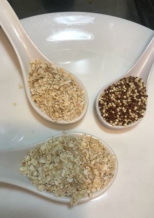 A picture of Oatmeal with quinoa, asparagus and fresh mushroom.