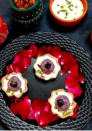 A picture of Purple Yam Ladoo With Coconut Basundi Katori.