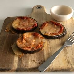 A picture of Aubergine slice with bolognese topped with mozzarella!!!.