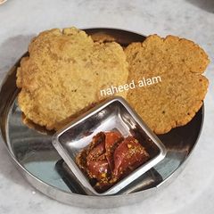 A picture of Kela Aur Singhare Atta Poori.