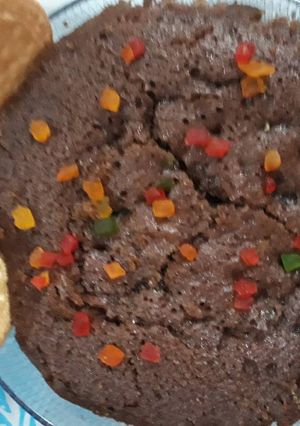 A picture of Egg less suji or maida ka chocolate cake in pressure cooker.