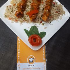 Peri peri skrewers with fried rice A picture of Peri peri skrewers with fried rice.
