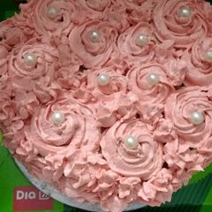 Chocolate cake with strawberry rosette frosting A picture of Chocolate cake with strawberry rosette frosting.