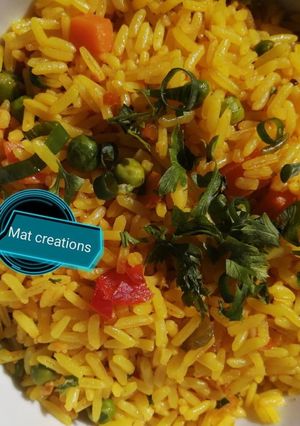 A picture of Yellow fried rice.