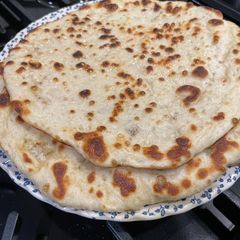 Greek pita bread A picture of Greek pita bread.
