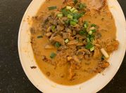 A picture of round steak in skillet