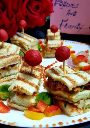 A picture of CHICKEN Tikkah Club sandwiches.