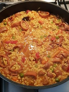 Una foto de Guiso de calamares con arroz
