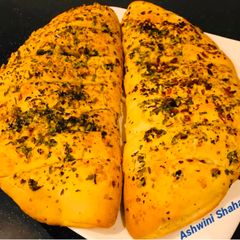 Dominos Style Stuffed Cheesy Garlic Bread A picture of Dominos Style Stuffed Cheesy Garlic Bread.