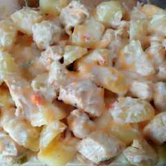Una foto de Pollo y patatas con queso