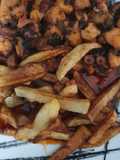 Pulpo al ajillo con patatas fritas