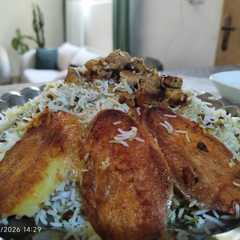A picture of عدس پلو با مرغ🍗🥘🍚.