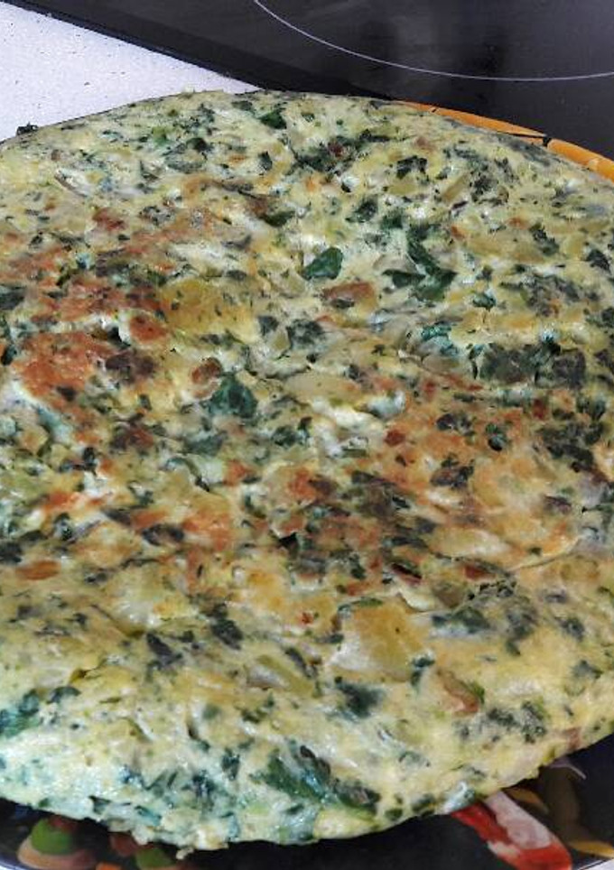 Una foto de Tortilla de patatas y espinacas