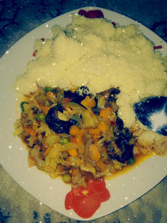 A picture of Couscous with vegetables sauce.